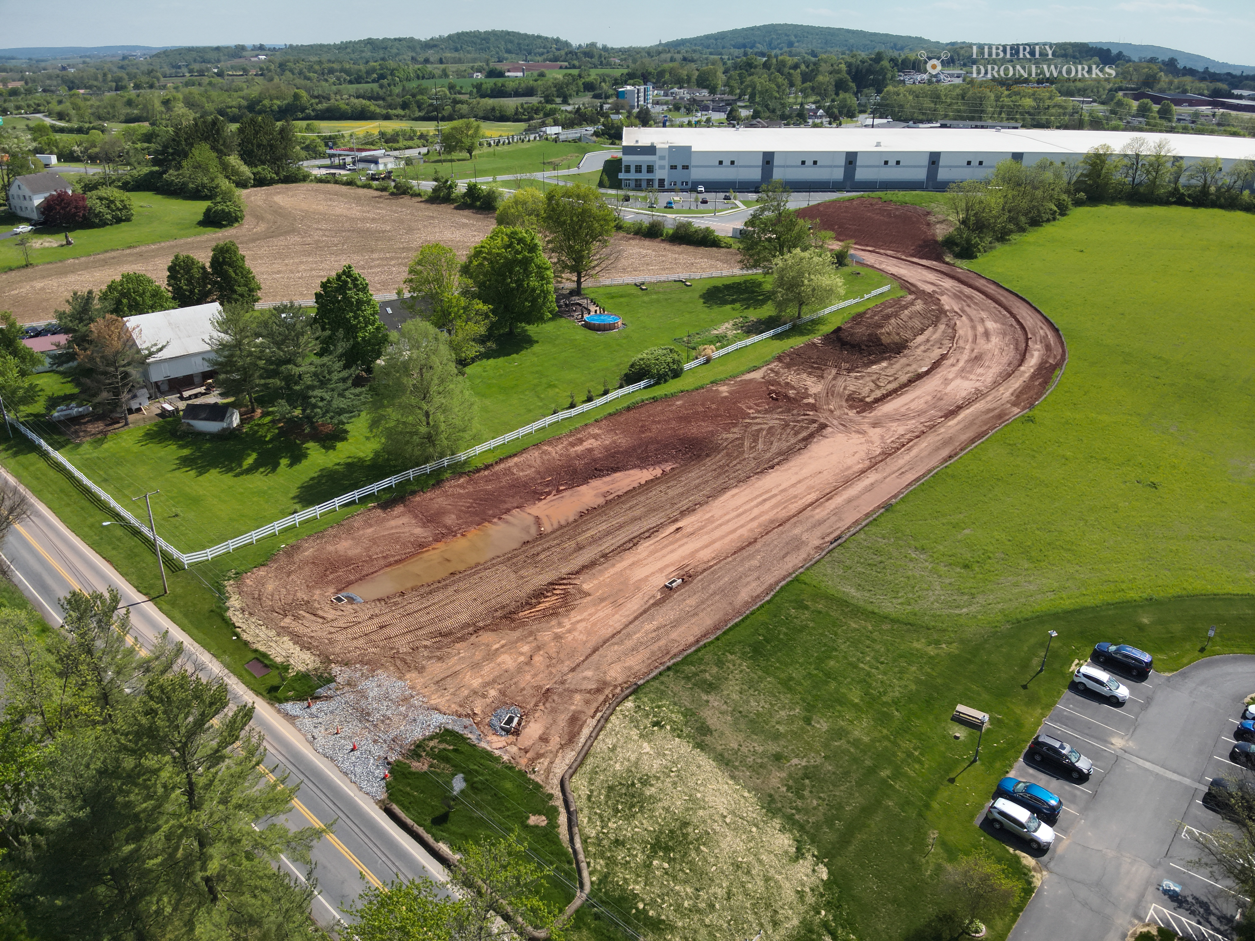 Wide aerial view of Hill Road project showing full site extent